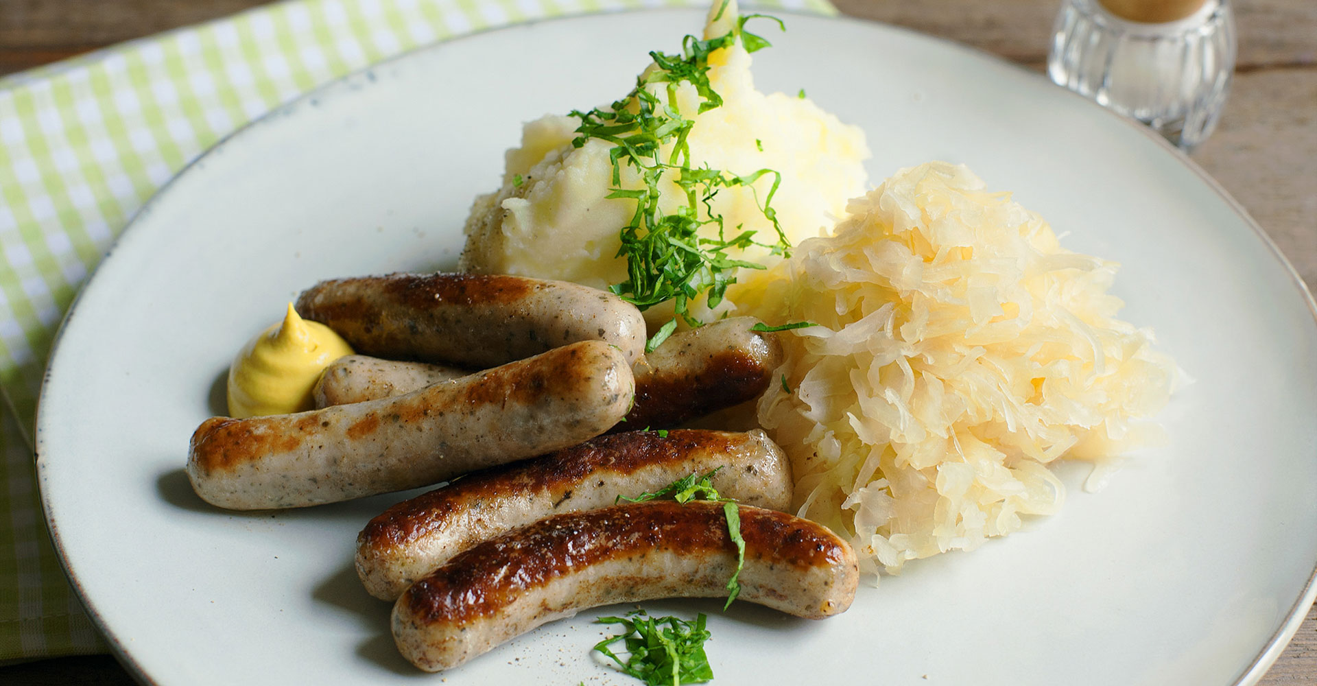 Nürnberger bratwursts with sauerkraut and mashed potatoes