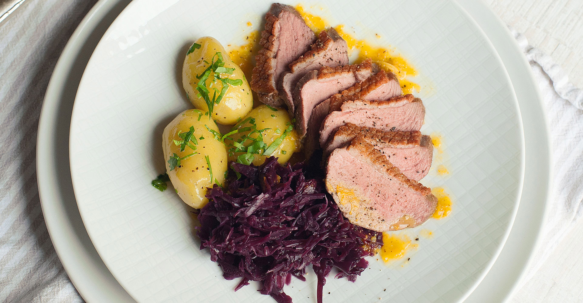 Roast duck with red cabbage and potatoes